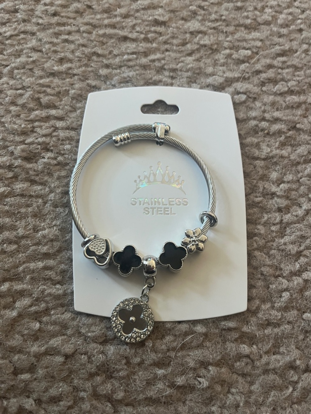 Silver-tone Bracelet with Black Clover Charms